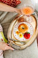 Brunch tray with curated dinnerware and crystal.