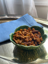 Nuts served in a Bordallo Pinheiro bowl.