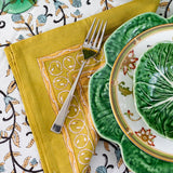Gold linen napkins with floral design