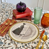 A Halloween place setting in black and white featuring a skull.
