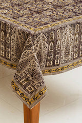 Decorative tablecloth with intricate patterns on a white surface