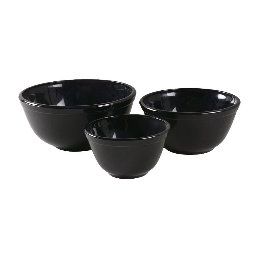 Three black bowls of different sizes on a white background
