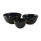 Three black bowls of different sizes on a white background