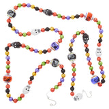 Colorful beaded necklace with Halloween-themed beads on a white background