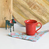 Red mug with recycled dog figurine