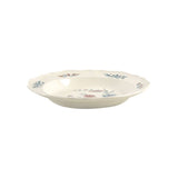 Ceramic bowl with floral patterns on a cream background