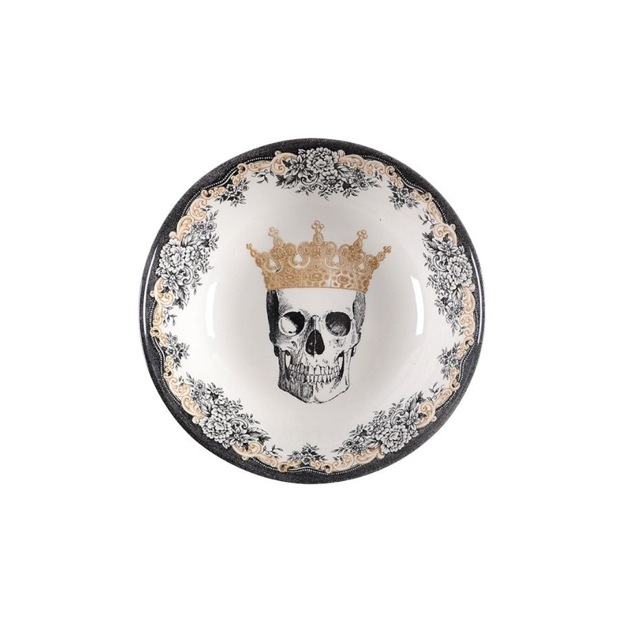 Decorative plate with a skull wearing a queen's crown and floral design on a white background