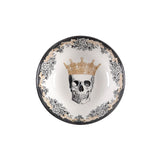 Decorative plate with a skull wearing a queen's crown and floral design on a white background