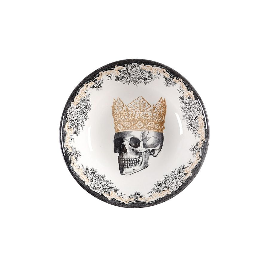 Decorative plate with skull and crown design on a white background