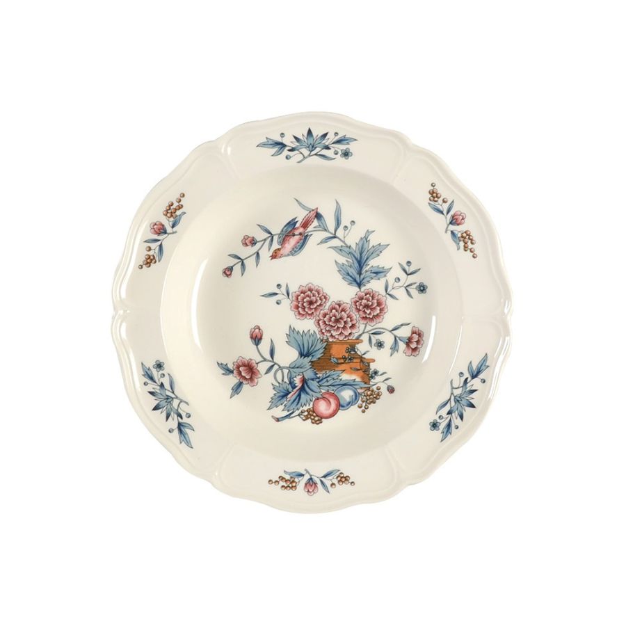 Decorative ceramic bowl with floral pattern on a white background