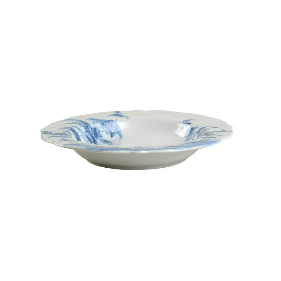 The Country Estate Delf Blue soup/pasta bowl features delicate handpainted renderings of tranquil scenes.