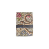 Notebook with floral and paisley design on a white background