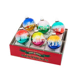 Set of 6 multicolored Christmas ball ornaments in a box on a white background