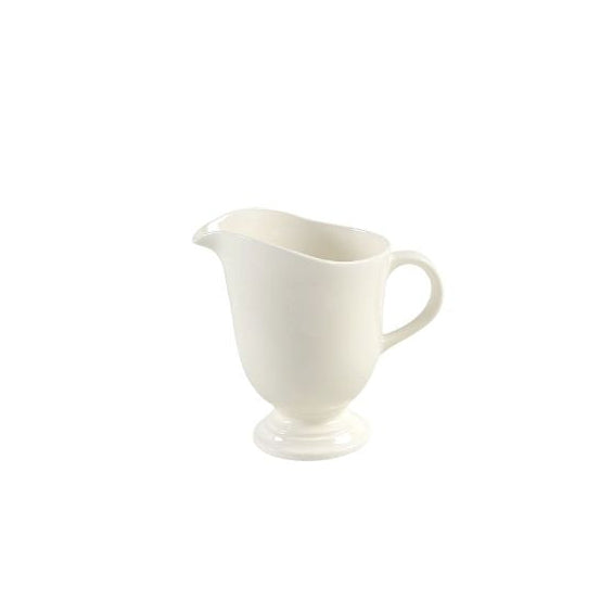 White ceramic creamer on a white background