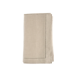 Folded beige linen napkins