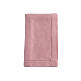 Pink napkin with hemstitching on a white background