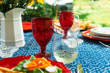 Mix clear and colorful glassware to style fresh, playful looks.