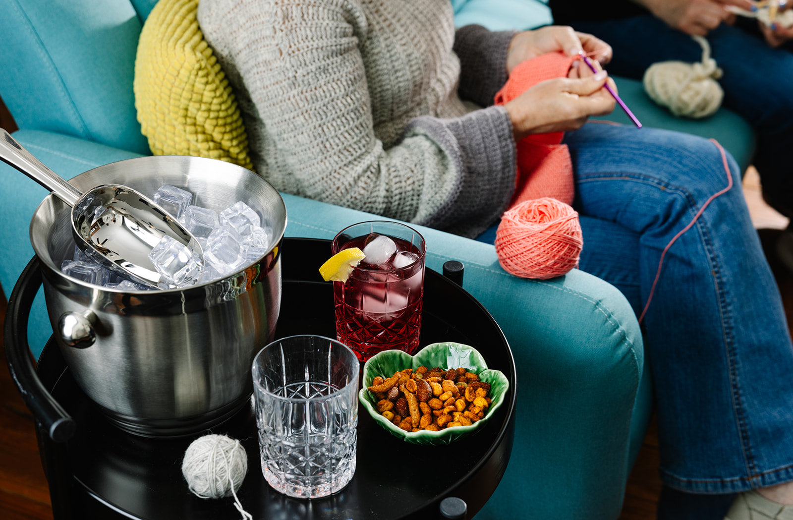 Bar cart set with Brady old fashioned glasses, an ice bucket, and snacks.