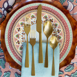 Sonoma Sun place setting with gold flatware