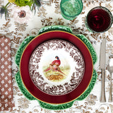Salad plate featuring two pheasants in the center with flower scroll design on the edge. Cranberry red dinner plate, Green cabbage shaped charger plate.