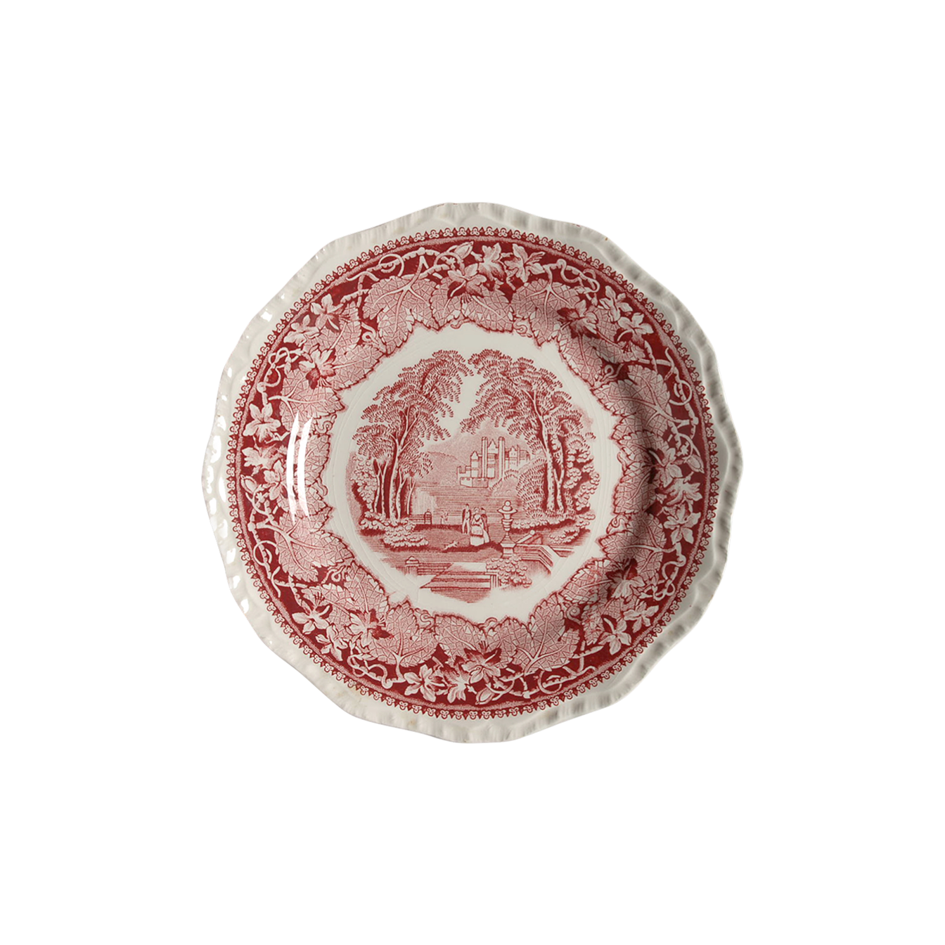 Decorative plate with red and white pattern on a white background