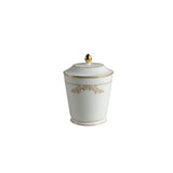 White ceramic jar with gold decorative elements on a white background