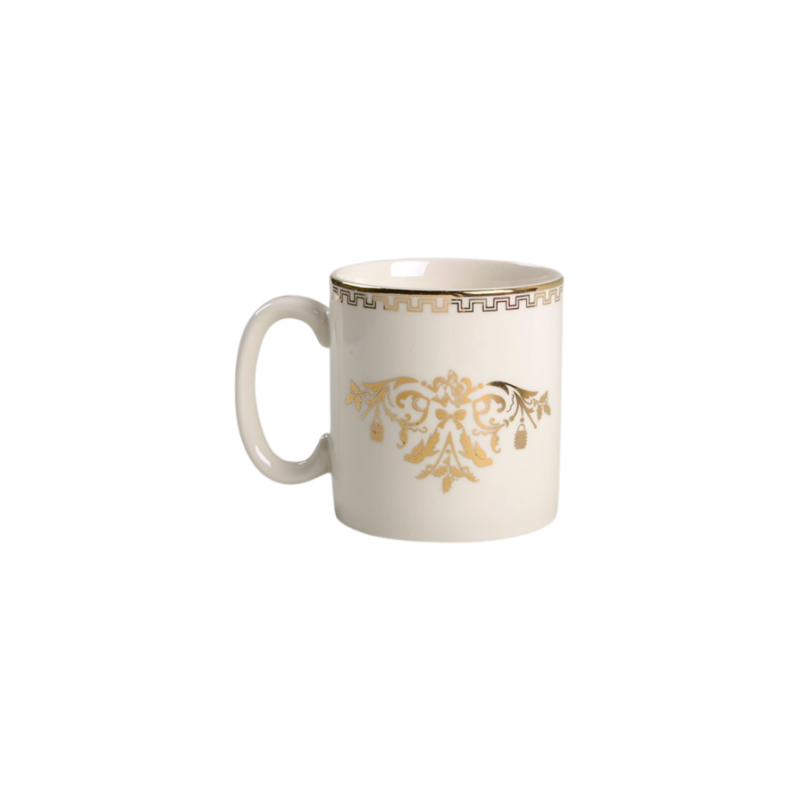 White mug with gold decorative pattern on a white background