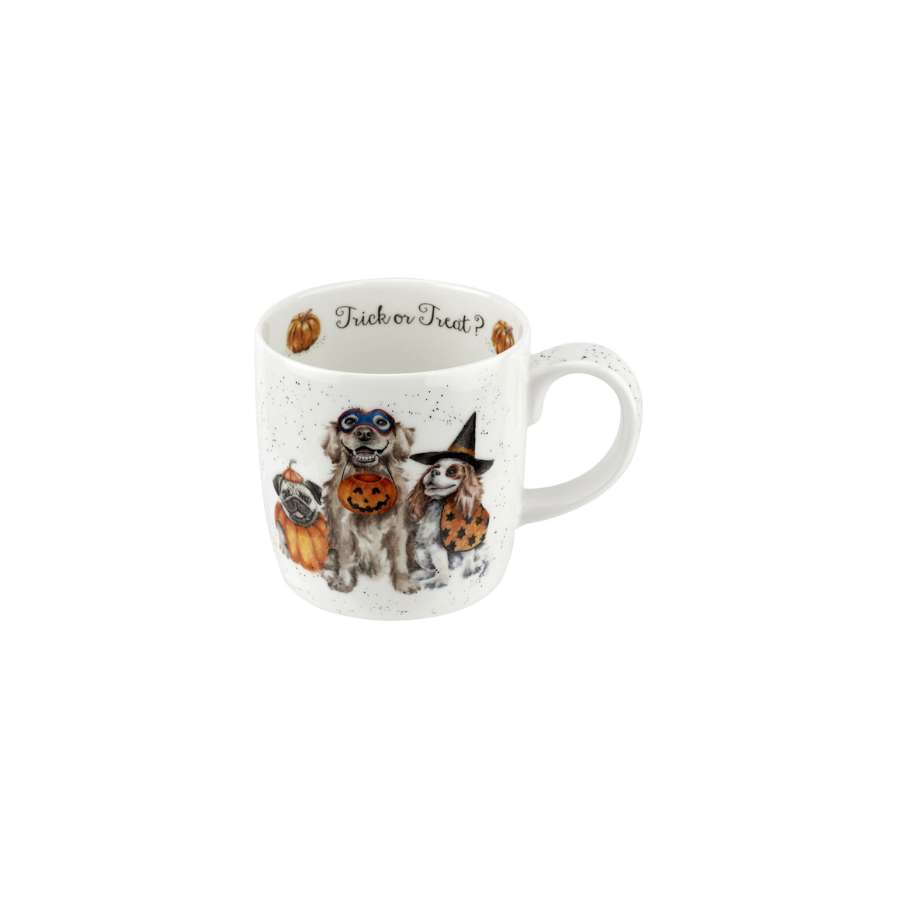 Mug with Halloween-themed design of dogs in costumes on a white background