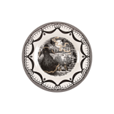 Decorative plate with a magical being and moon design on a white background