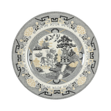 Chinese-inspired willow design in black and gold on ivory plate.