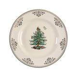 Decorative dinner plate featuring a Christmas tree and gold decoration.