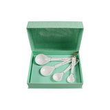 Boxed set of white measuring spoons