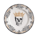 Plate with a floral rim depicting a skull in a crown.