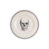 Round plate with a skull design on a white background