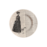 Plate depicting a skeleton in a Victorian dress walking her skeletal dog.
