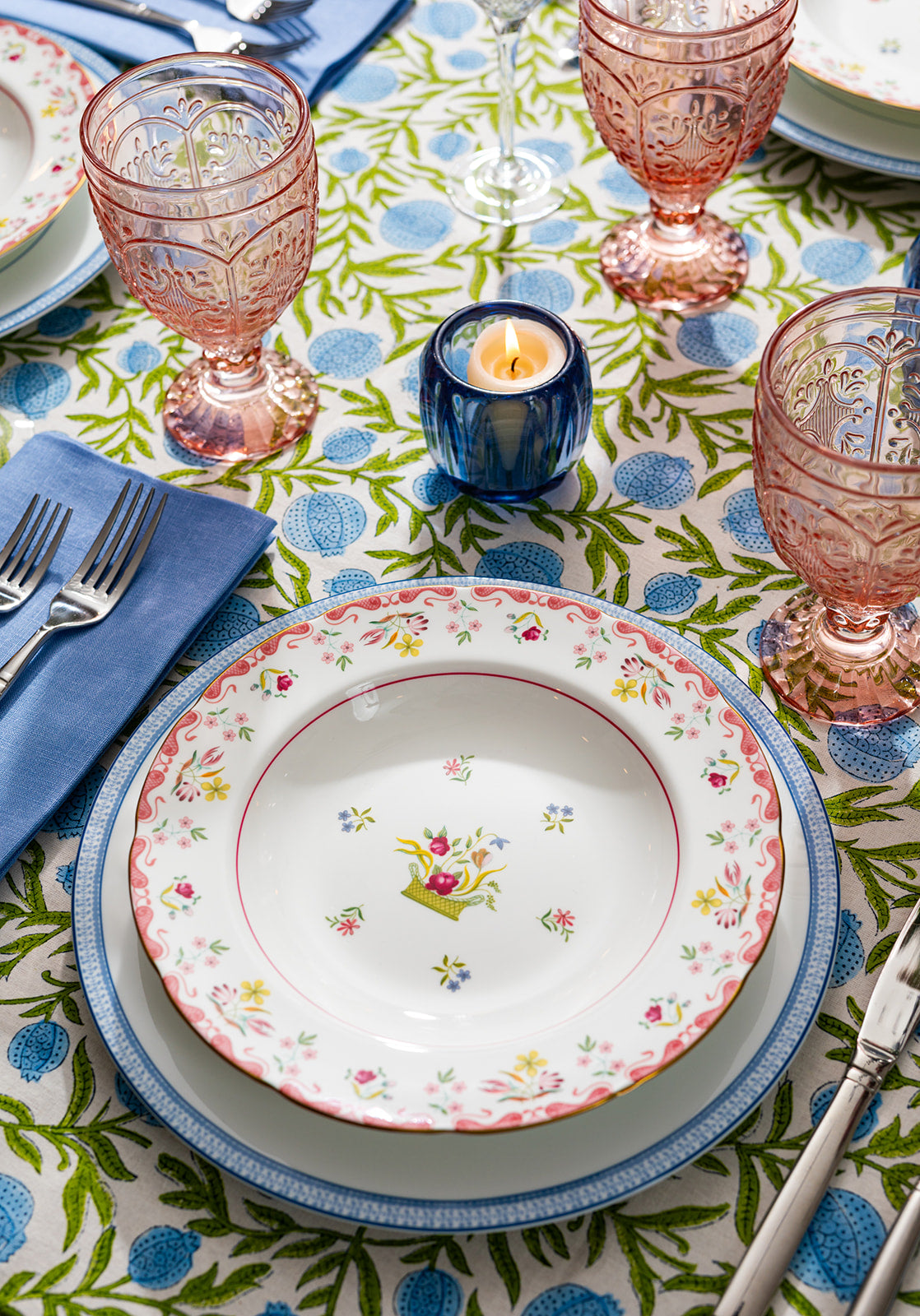 Cape May table setting with Macao salad plate and Trestle Pink goblets.